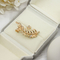 Gli orecchini che di lusso dell'oro della lega i perni coprono di foglie fiore modellano i cristalli brillanti 4 pc